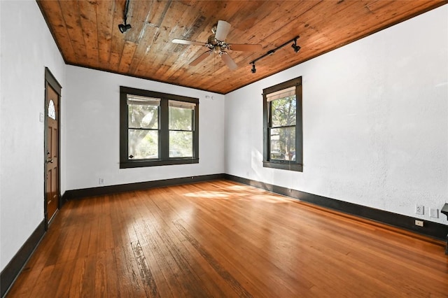 5112 Caswell Ave, Austin, TX 78751 - unfurnished room with track lighting, wood ceiling, hardwood / wood-style flooring, and a ceiling fan