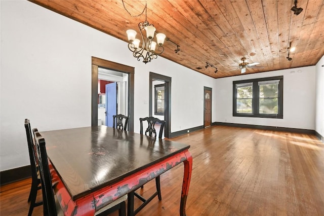 5112 Caswell Ave, Austin, TX 78751 - dining space featuring wooden ceiling, a chandelier, and hardwood / wood-style floors