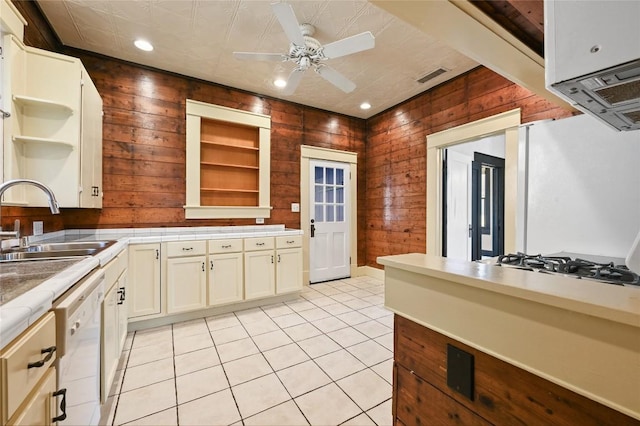 5112 Caswell Ave, Austin, TX 78751 - kitchen with open shelves, white appliances, a ceiling fan, wood walls, and light tile patterned floors
