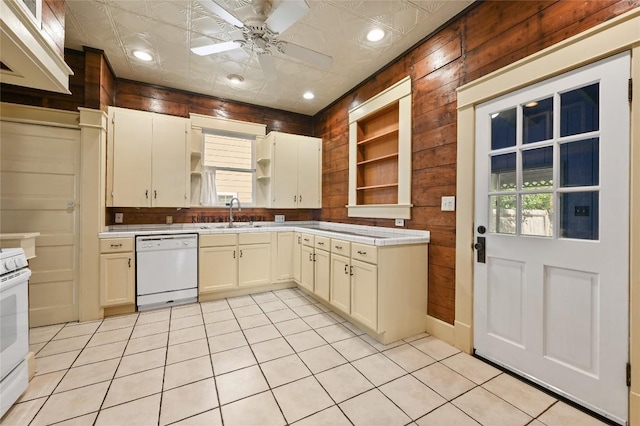 5112 Caswell Ave, Austin, TX 78751 - kitchen featuring open shelves, white appliances, wooden walls, ceiling fan, and light tile patterned floors