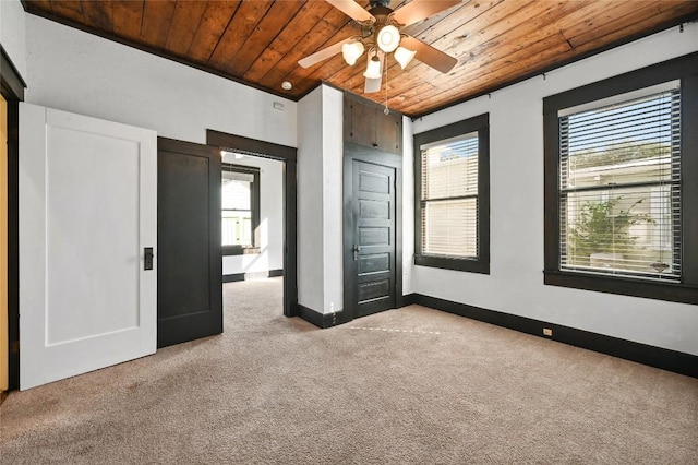 5112 Caswell Ave, Austin, TX 78751 - unfurnished bedroom featuring carpet, wood ceiling, and a ceiling fan