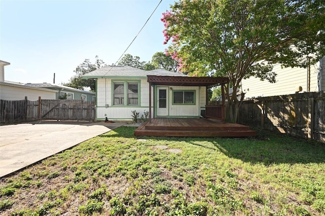5112 Caswell Ave, Austin, TX 78751 - back of property with a fenced backyard and a deck