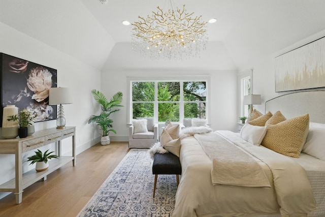 6905 Rudi Cv, Austin, TX 78759 - bedroom featuring multiple windows, light wood-style floors, vaulted ceiling, a chandelier, and recessed lighting