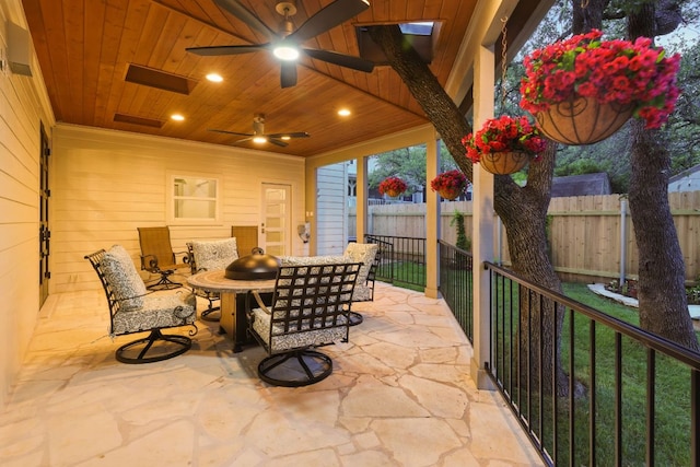 6905 Rudi Cv, Austin, TX 78759 - view of patio featuring ceiling fan and outdoor dining space