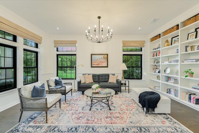 3342 Far View Dr, Austin, TX 78730 - living area featuring a chandelier, built in features, and ornamental molding