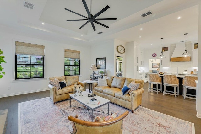3342 Far View Dr, Austin, TX 78730 - living area featuring a raised ceiling, ceiling fan, wood finished floors, and recessed lighting