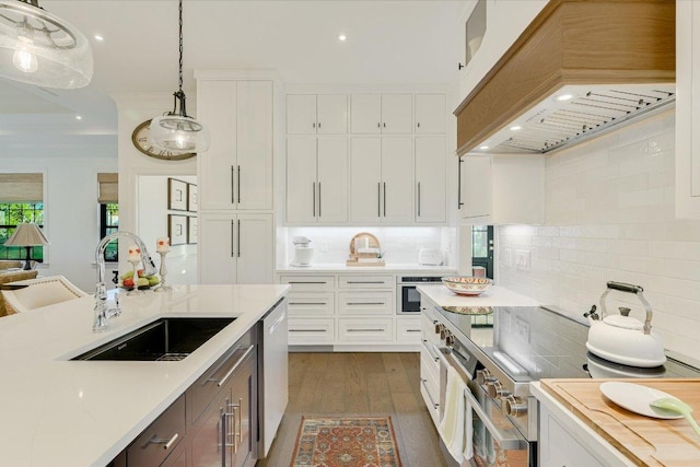 3342 Far View Dr, Austin, TX 78730 - kitchen with custom range hood, light countertops, backsplash, and recessed lighting