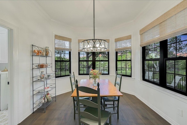 3342 Far View Dr, Austin, TX 78730 - dining room featuring dark wood-style floors, ornamental molding, and a chandelier