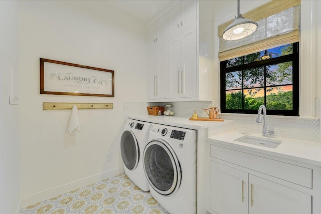3342 Far View Dr, Austin, TX 78730 - laundry area with washer and dryer and cabinet space