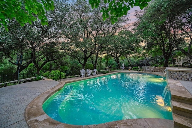 9105 Westminster Glen Ave, Austin, TX 78730 - outdoor pool featuring view of wooded area