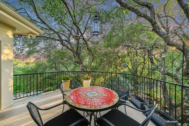 9105 Westminster Glen Ave, Austin, TX 78730 - balcony with outdoor dining space