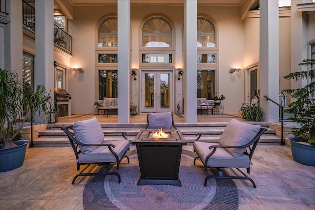 9105 Westminster Glen Ave, Austin, TX 78730 - view of patio with french doors and a fire pit