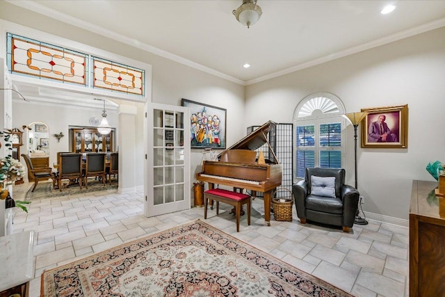 9105 Westminster Glen Ave, Austin, TX 78730 - living area with stone tile flooring, recessed lighting, ornamental molding, and french doors