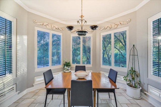 9105 Westminster Glen Ave, Austin, TX 78730 - dining space featuring a chandelier, ornamental molding, and light tile patterned floors