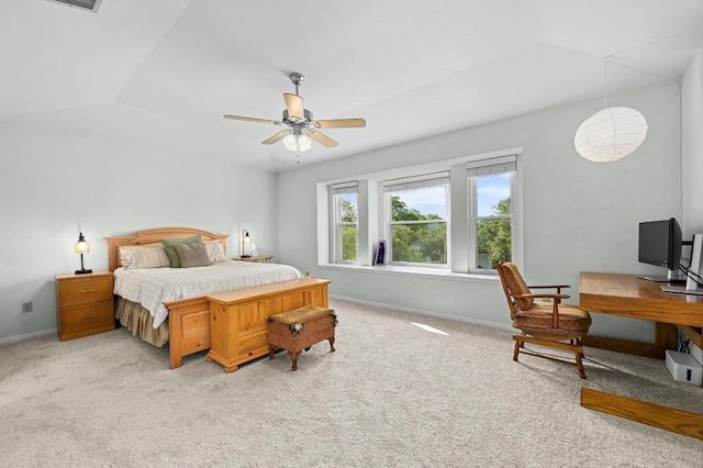 6712 Shiner St, Austin, TX 78729 - bedroom featuring light carpet, a desk, and a ceiling fan