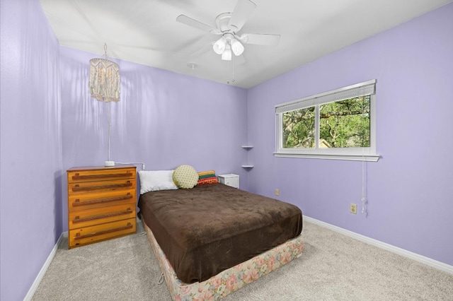 6712 Shiner St, Austin, TX 78729 - carpeted bedroom featuring baseboards and a ceiling fan