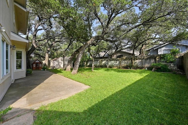 6712 Shiner St, Austin, TX 78729 - fenced backyard with a patio