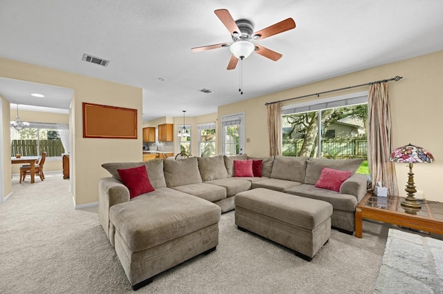 6712 Shiner St, Austin, TX 78729 - living area with light carpet and ceiling fan