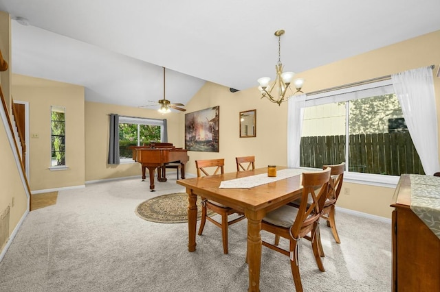 6712 Shiner St, Austin, TX 78729 - dining space featuring light colored carpet, lofted ceiling, and a chandelier