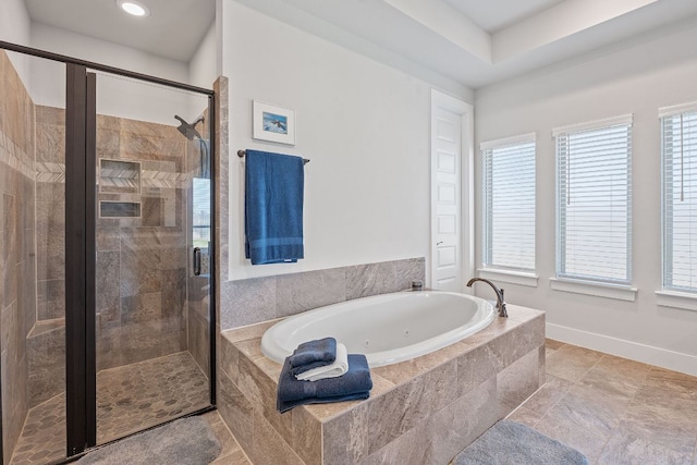 164 Mary Cornelia Cv, Buda, TX 78610 - bathroom featuring a whirlpool tub, a shower stall, and recessed lighting