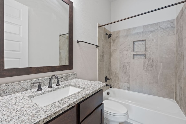 164 Mary Cornelia Cv, Buda, TX 78610 - bathroom featuring vanity, shower / tub combination, and a textured wall