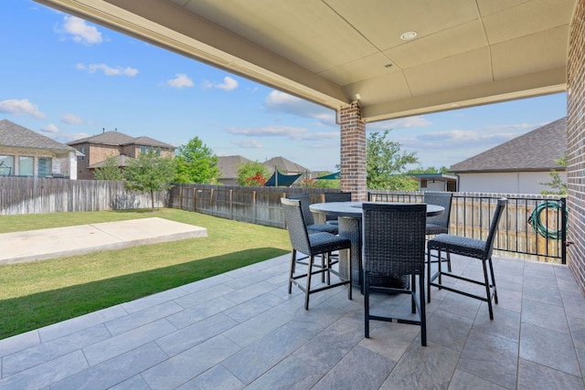164 Mary Cornelia Cv, Buda, TX 78610 - fenced backyard with a patio and a residential view