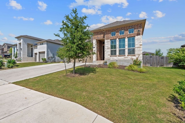 164 Mary Cornelia Cv, Buda, TX 78610 - view of front facade featuring stone siding, an attached garage, driveway, and a residential view