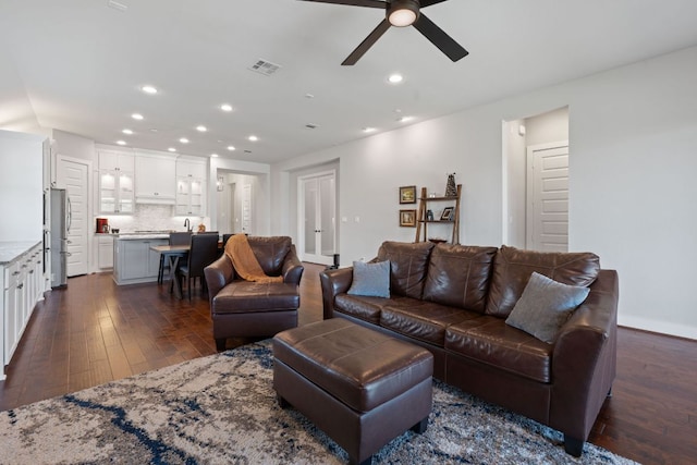 164 Mary Cornelia Cv, Buda, TX 78610 - living room with dark wood-type flooring, a ceiling fan, and recessed lighting