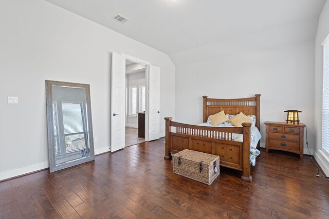 164 Mary Cornelia Cv, Buda, TX 78610 - bedroom featuring wood-type flooring and lofted ceiling