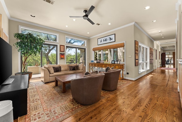59 Stillmeadow Dr, The Hills, TX 78738 - living area with wood finished floors, ornamental molding, recessed lighting, and ceiling fan