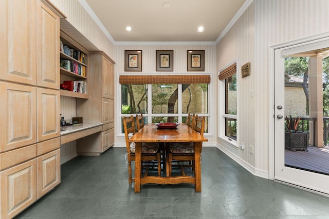 59 Stillmeadow Dr, The Hills, TX 78738 - dining area featuring ornamental molding and built in desk