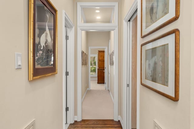 59 Stillmeadow Dr, The Hills, TX 78738 - hall featuring dark wood-type flooring and baseboards