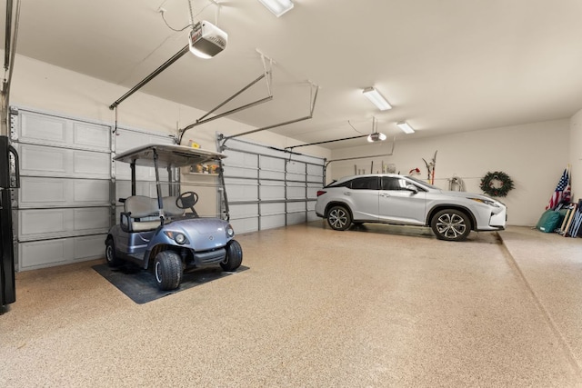 59 Stillmeadow Dr, The Hills, TX 78738 - garage featuring a garage door opener