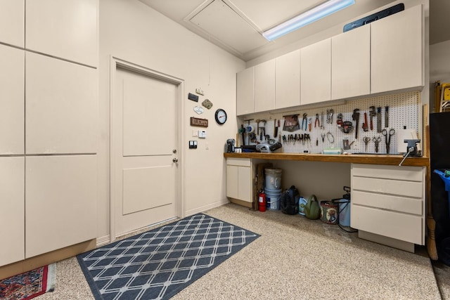 59 Stillmeadow Dr, The Hills, TX 78738 - misc room with a workshop area