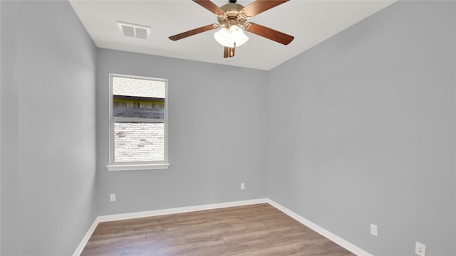 1086 Sussex Way, Round Rock, TX 78665 - unfurnished room with wood finished floors and a ceiling fan