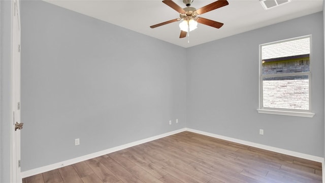 1086 Sussex Way, Round Rock, TX 78665 - unfurnished room featuring wood finished floors and ceiling fan