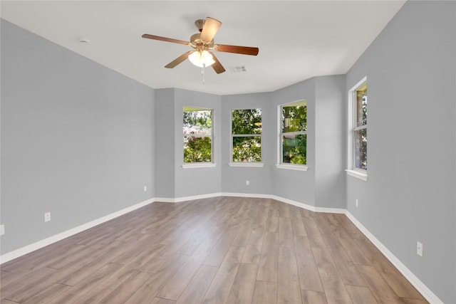 1086 Sussex Way, Round Rock, TX 78665 - spare room with a ceiling fan and wood finished floors