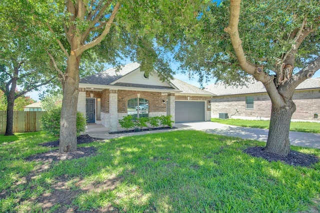1086 Sussex Way, Round Rock, TX 78665 - view of front of home featuring a garage, driveway, brick siding, and roof with shingles
