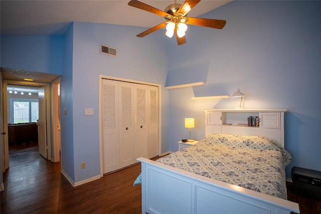 8403 Ardash Ln, Austin, TX 78759 - bedroom featuring high vaulted ceiling, dark wood finished floors, a closet, and ceiling fan