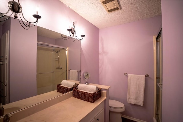 8403 Ardash Ln, Austin, TX 78759 - full bathroom with a textured ceiling, a shower with shower door, and vanity