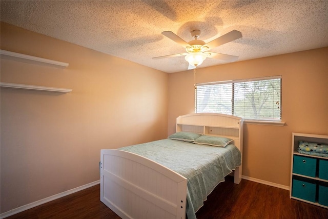 8403 Ardash Ln, Austin, TX 78759 - bedroom featuring wood finished floors, ceiling fan, and a textured ceiling