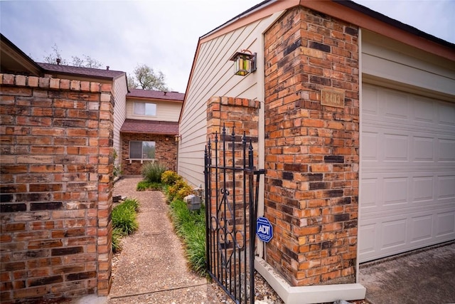 8403 Ardash Ln, Austin, TX 78759 - property entrance with brick siding and a gate
