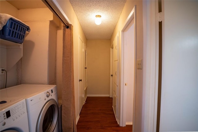 8403 Ardash Ln, Austin, TX 78759 - laundry room with dark wood finished floors, a textured ceiling, and independent washer and dryer