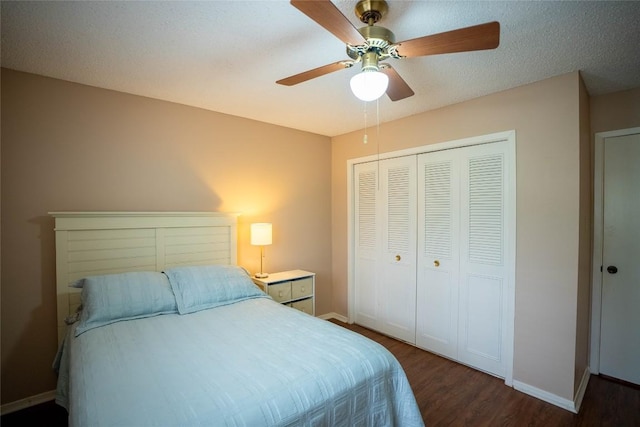 8403 Ardash Ln, Austin, TX 78759 - bedroom with wood finished floors, a closet, and a ceiling fan