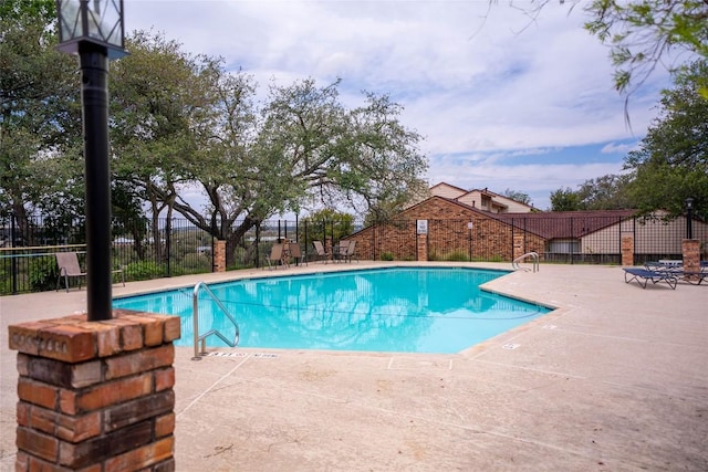 8403 Ardash Ln, Austin, TX 78759 - community pool featuring a patio