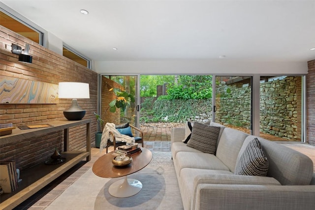 4506 Crestway Dr, Austin, TX 78731 - living room featuring brick wall and recessed lighting