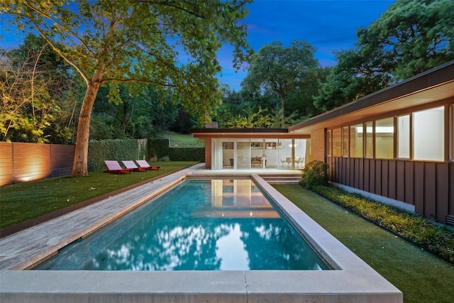 4506 Crestway Dr, Austin, TX 78731 - view of swimming pool with a fenced backyard, a storage structure, and an outbuilding