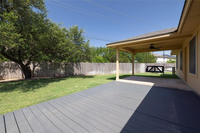 3203 Saint Genevieve Dr, Leander, TX 78641 - wooden terrace featuring a ceiling fan, a fenced backyard, and a patio