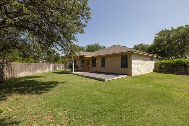 3203 Saint Genevieve Dr, Leander, TX 78641 - rear view of property featuring a fenced backyard and stone siding