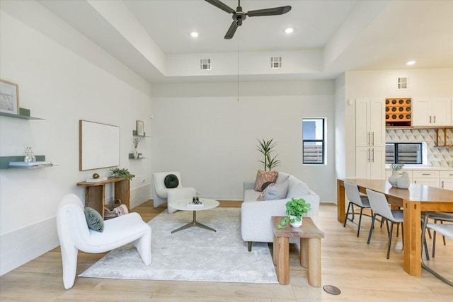902 W Live Oak St, Austin, TX 78704 - living room with a ceiling fan, light wood-type flooring, a raised ceiling, and recessed lighting